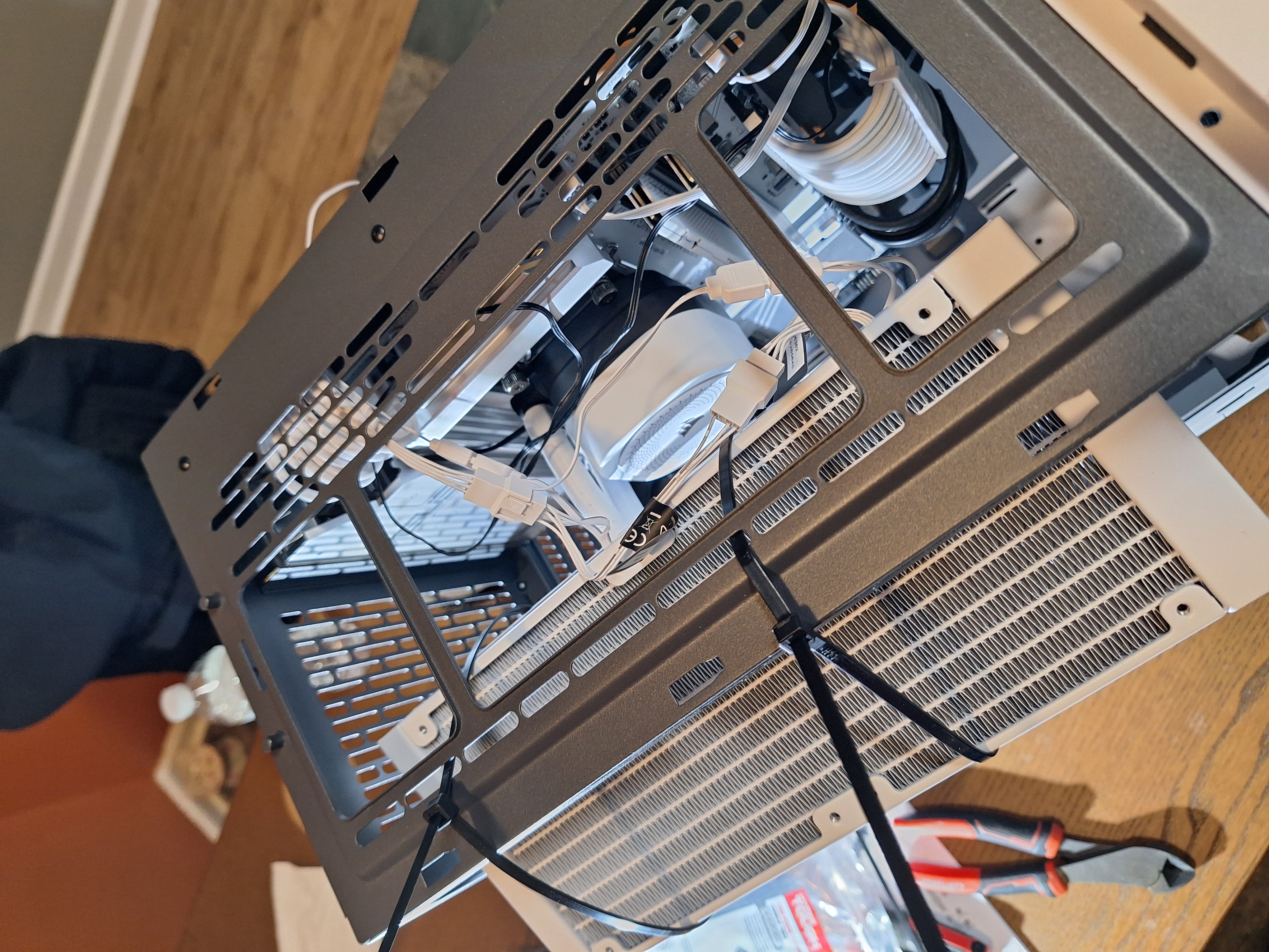 Top view of the radiator and fan wiring during assembly